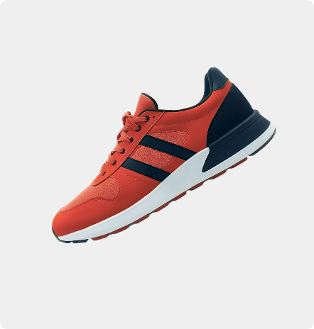 Orange, navy, and white running shoe on a light background